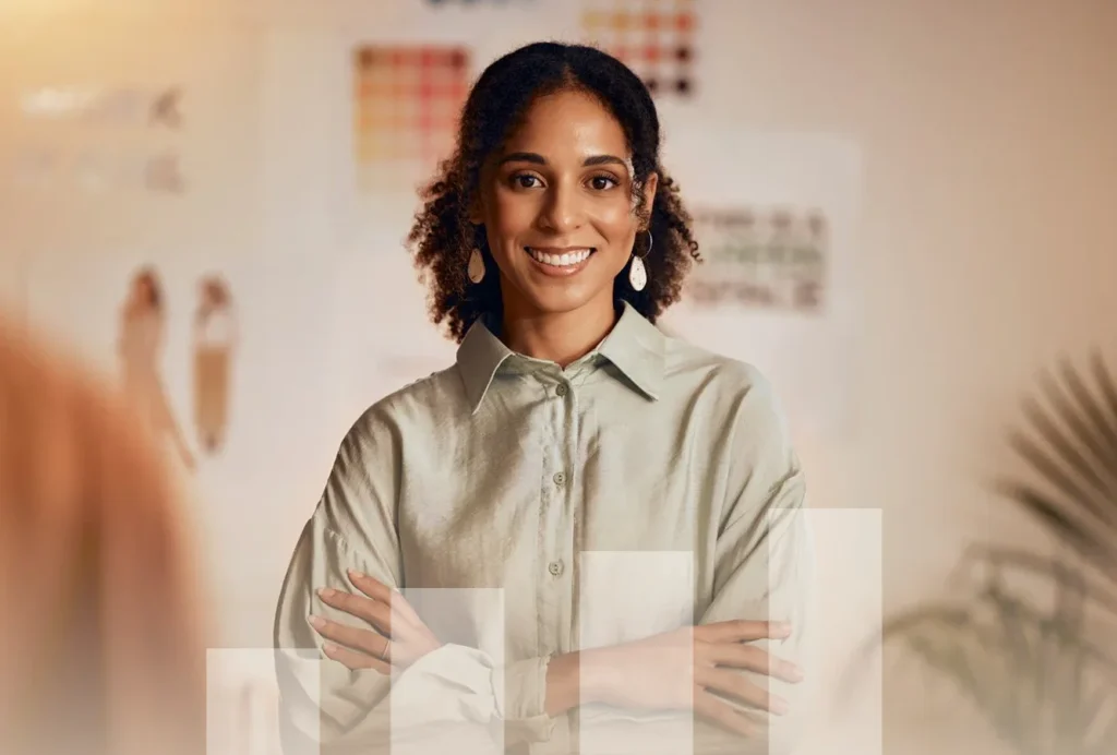 A smiling woman stands before a graph, symbolizing the effectiveness of financial growth assessment tools in her analysis.